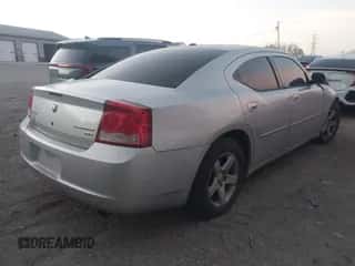 2010 Dodge Charger SXT с VIN 2B3CA3CV8AH309572, выставлен на аукционе IAAI как лот 43340121 с пробегом 255 529 миль миль и . История ставок и продаж доступна на DreamBid. Изображение 4.