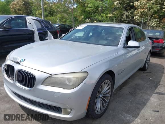 2011 BMW 7 Series 750Li xDrive with VIN WBAKC8C5XBC433796, listed as a IAAI auction lot 42006609 with 182,648 mi miles and . Bid and sale history available at DreamBid. Image 2.