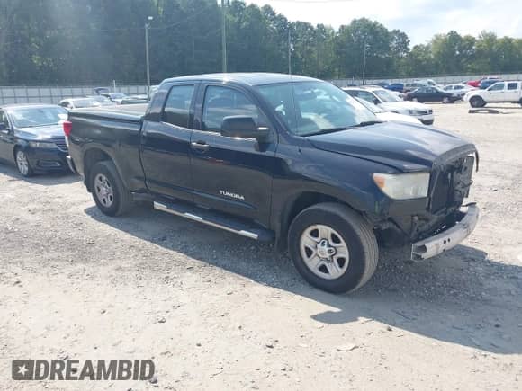 2012 Toyota Tundra z VIN 5TFRU5F11CX027728, wystawiony jako IAAI lot #43122765 z przebiegiem 196 119 mil mil oraz . Historia ofert i sprzedaży dostępna na DreamBid. Obrazek 1.
