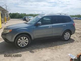 2013 Subaru Forester X Touring z VIN JF2SHAHC4DH407205, wystawiony jako Copart lot #56194985 z przebiegiem 242 818 mil mil oraz Czysty tytuł • Clean title. Historia ofert i sprzedaży dostępna na DreamBid. Obrazek 1.