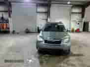 2014 Subaru Forester Limited z VIN JF2SJAJC4EH469915, wystawiony jako Copart lot #82171955 z przebiegiem 169 460 mil mil oraz Szkoda całkowita • Salvage title. Historia ofert i sprzedaży dostępna na DreamBid. Obrazek 14.