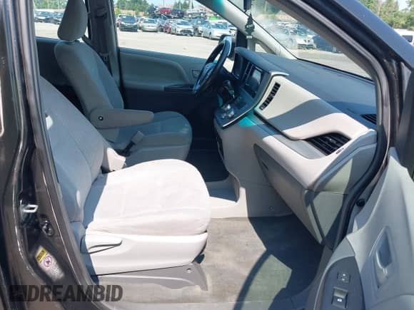 2015 Toyota Sienna L with VIN 5TDZK3DC1FS539076, listed as a IAAI auction lot 42913036 with 118,898 mi miles and . Bid and sale history available at DreamBid. Image 5.