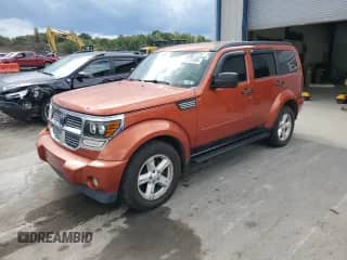 2007 Dodge Nitro SLT with VIN 1D8GU58K57W609390, listed as a Copart auction lot 71275105 with 166,051 mi miles and Salvage title. Bid and sale history available at DreamBid. Image 1.