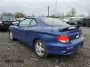 2001 Hyundai Tiburon с VIN KMHJG25F91U250108, выставлен на аукционе Copart как лот 50905795 с пробегом 61 803 миль миль и Списание • Salvage title. История ставок и продаж доступна на DreamBid. Изображение 2.