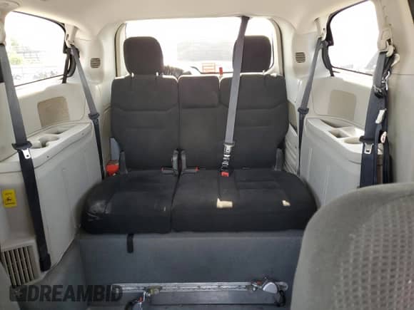2016 Dodge Grand Caravan SE z VIN 2C4RDGBG1GR400969, wystawiony jako Copart lot #65642405 z przebiegiem 252 022 mil mil oraz Czysty tytuł • Clean title. Historia ofert i sprzedaży dostępna na DreamBid. Obrazek 10.