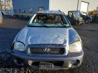 2002 Hyundai Santa Fe GLS с VIN KM8SC73D62U247487, выставлен на аукционе Copart как лот 81324114 с пробегом 220 620 миль миль и Списание • Salvage title. История ставок и продаж доступна на DreamBid. Изображение 5.