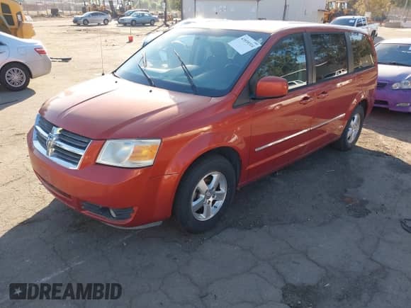 2008 Dodge Grand Caravan SXT z VIN 2D8HN54P18R686433, wystawiony jako IAAI lot #43539314 z przebiegiem 270 483 mil mil oraz . Historia ofert i sprzedaży dostępna na DreamBid. Obrazek 2.