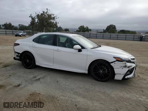 2023 Toyota Camry Hybrid SE with VIN 4T1S31AK0PU046562, listed as a Copart auction lot 69478395 with 84,935 mi miles and Salvage title. Bid and sale history available at DreamBid. Image 4.