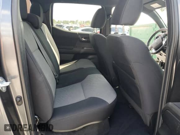 2022 Toyota Tacoma TRD Off Road with VIN 3TMCZ5AN4NM515100, listed as a Copart auction lot 84576995 with 33,917 mi miles and Salvage title. Bid and sale history available at DreamBid. Image 10.