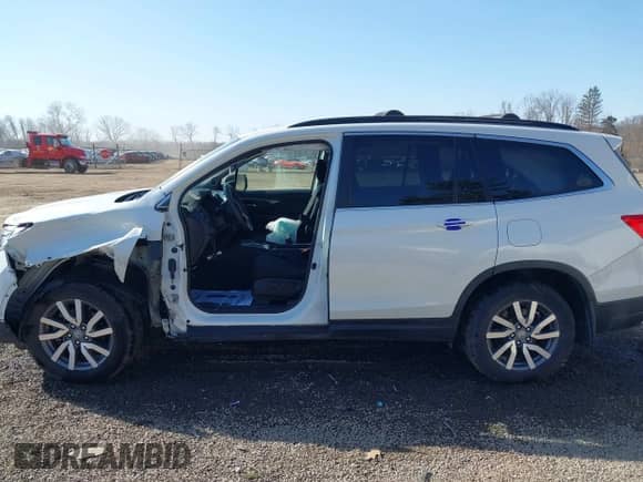 2021 Honda Pilot EX with VIN 5FNYF6H31MB010966, listed as a IAAI auction lot 41767634 with 53,303 mi miles and . Bid and sale history available at DreamBid. Image 15.