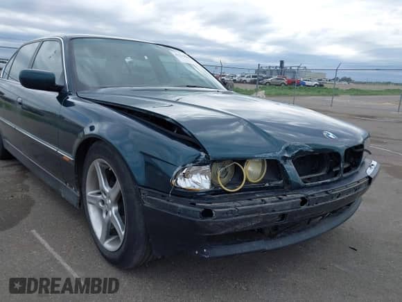 1997 BMW 7 Series 740iL with VIN WBAGJ8325VDL42466, listed as a IAAI auction lot 42279036 with 174,161 mi miles and . Bid and sale history available at DreamBid. Image 6.