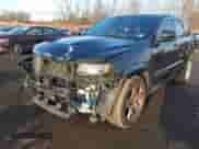 2015 Jeep Grand Cherokee SRT with VIN 1C4RJFDJ6FC744087, listed as a IAAI auction lot 41500653 with 130,530 mi miles and . Bid and sale history available at DreamBid. Image 2.