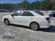 2012 Toyota Camry XLE z VIN 4T1BD1FK8CU022512, wystawiony jako Copart lot #82413865 z przebiegiem Nie podano mil oraz Szkoda całkowita • Salvage title. Historia ofert i sprzedaży dostępna na DreamBid. Obrazek 2.