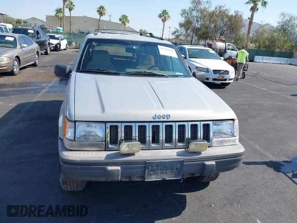 1994 Jeep Grand Cherokee Laredo with VIN 1J4GZ58S4RC325909, listed as a IAAI auction lot 39580601 with 162,952 mi miles and . Bid and sale history available at DreamBid. Image 6.