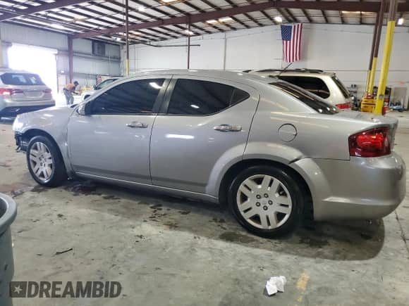 2014 Dodge Avenger SE с VIN 1C3CDZABXEN127097, выставлен на аукционе Copart как лот 66467404 с пробегом 166 678 миль миль и Списание • Salvage title. История ставок и продаж доступна на DreamBid. Изображение 2.