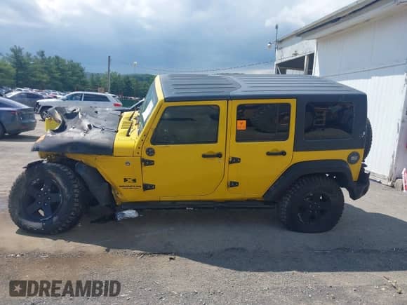 2008 Jeep Wrangler Unlimited X z VIN 1J4GA39178L632670, wystawiony jako IAAI lot #42888116 z przebiegiem Nie podano mil oraz . Historia ofert i sprzedaży dostępna na DreamBid. Obrazek 14.