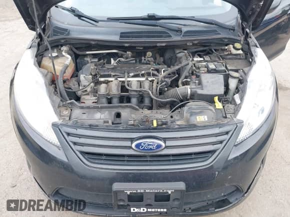 2013 Ford Fiesta S z VIN 3FADP4AJ2DM175189, wystawiony jako IAAI lot #43185551 z przebiegiem 114 768 mil mil oraz . Historia ofert i sprzedaży dostępna na DreamBid. Obrazek 10.
