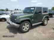 2007 Jeep Wrangler Sahara z VIN 1J8FA54137L145641, wystawiony jako Copart lot #60125185 z przebiegiem 160 119 mil mil oraz Szkoda całkowita • Salvage title. Historia ofert i sprzedaży dostępna na DreamBid. Obrazek 1.