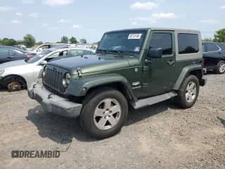 2007 Jeep Wrangler Sahara с VIN 1J8FA54137L145641, выставлен на аукционе Copart как лот 60125185 с пробегом 160 119 миль миль и Списание • Salvage title. История ставок и продаж доступна на DreamBid. Изображение 1.