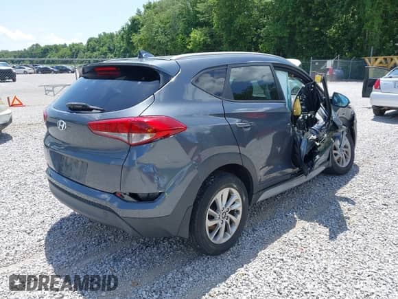 2017 Hyundai Tucson SE with VIN KM8J33A44HU459269, listed as a IAAI auction lot 42664365 with 99,602 mi miles and . Bid and sale history available at DreamBid. Image 4.