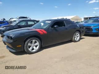 2012 Dodge Challenger R/T with VIN 2C3CDYBT5CH144395, listed as a Copart auction lot 60336105 with 58,920 mi miles and Salvage title. Bid and sale history available at DreamBid. Image 1.