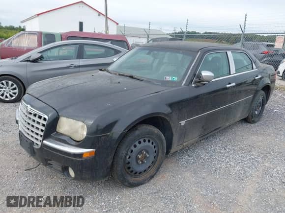 2006 Chrysler 300 C with VIN 2C3KK63H46H263690, listed as a IAAI auction lot 43401520 with 156,740 mi miles and . Bid and sale history available at DreamBid. Image 2.