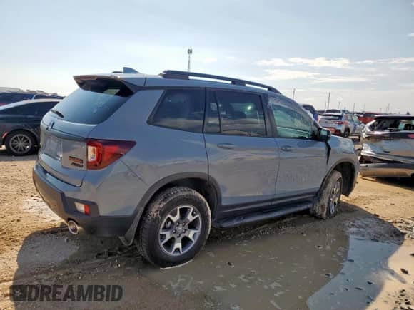 2022 Honda Passport TrailSport z VIN 5FNYF8H65NB021704, wystawiony jako Copart lot #69507175 z przebiegiem 42 578 mil mil oraz Szkoda całkowita • Salvage title. Historia ofert i sprzedaży dostępna na DreamBid. Obrazek 3.