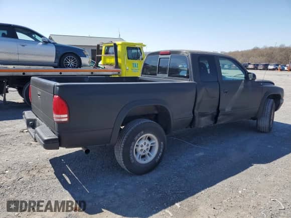 1997 Dodge Dakota z VIN 1B7GG23X3VS217651, wystawiony jako Copart lot #48300715 z przebiegiem 177 554 mil mil oraz Szkoda całkowita • Salvage title. Historia ofert i sprzedaży dostępna na DreamBid. Obrazek 3.