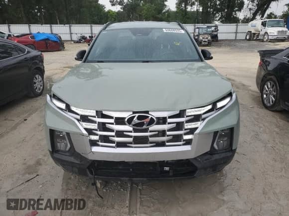 2023 Hyundai Santa Cruz SEL Premium с VIN 5NTJDDAF6PH051083, выставлен на аукционе Copart как лот 69608535 с пробегом 137 822 миль миль и На запчасти • Non repairable. История ставок и продаж доступна на DreamBid. Изображение 5.
