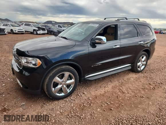 2012 Dodge Durango Citadel with VIN 1C4SDHET8CC253004, listed as a Copart auction lot 89704445 with 115,998 mi miles and Salvage title. Bid and sale history available at DreamBid. Image 1.