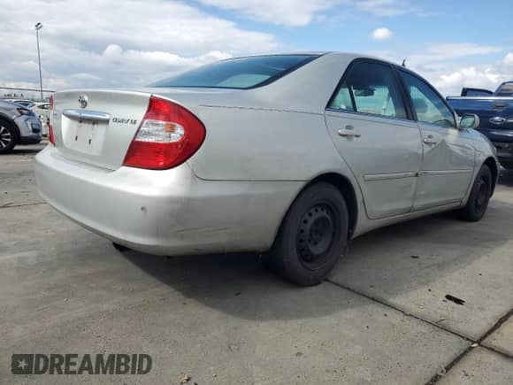 2003 Toyota Camry XLE с VIN 4T1BE32K73U733794, выставлен на аукционе Copart как лот 86666555 с пробегом 203 797 миль миль и Чистый • Clean title. История ставок и продаж доступна на DreamBid. Изображение 3.
