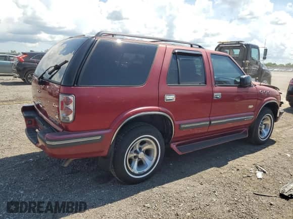 1999 Chevrolet Blazer LS z VIN 1GNCS13W2X2244428, wystawiony jako Copart lot #66462484 z przebiegiem Nie podano mil oraz Szkoda całkowita • Salvage title. Historia ofert i sprzedaży dostępna na DreamBid. Obrazek 3.