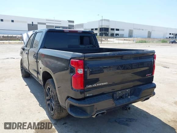2024 Chevrolet Silverado 1500 RST with VIN 1GCUDEED8RZ166452, listed as a IAAI auction lot 43095521 with 50,889 mi miles and . Bid and sale history available at DreamBid. Image 3.