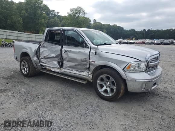 2014 Ram 1500 Laramie z VIN 1C6RR7NT7ES374567, wystawiony jako Copart lot #69382485 z przebiegiem 153 374 mil mil oraz Szkoda całkowita • Salvage title. Historia ofert i sprzedaży dostępna na DreamBid. Obrazek 4.