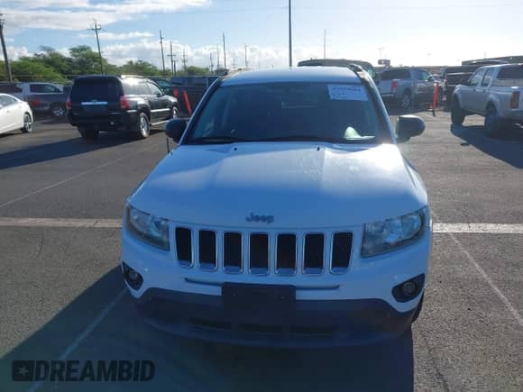 2014 Jeep Compass Sport z VIN 1C4NJCBA4ED881778, wystawiony jako IAAI lot #43359604 z przebiegiem 92 729 mil mil oraz . Historia ofert i sprzedaży dostępna na DreamBid. Obrazek 6.