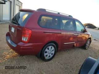 2007 Hyundai Entourage GLS z VIN KNDMC233276043451, wystawiony jako Copart lot #82794964 z przebiegiem 169 877 mil mil oraz Czysty tytuł • Clean title. Historia ofert i sprzedaży dostępna na DreamBid. Obrazek 3.