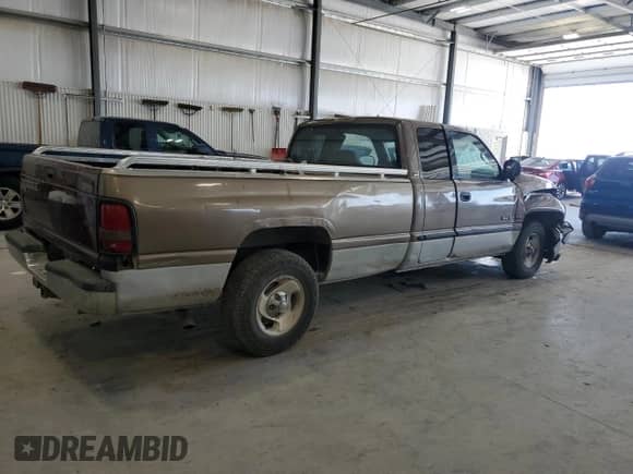 2001 Dodge 1500 z VIN 3B7HC13ZX1G202500, wystawiony jako Copart lot #69653765 z przebiegiem 155 949 mil mil oraz Szkoda całkowita • Salvage title. Historia ofert i sprzedaży dostępna na DreamBid. Obrazek 3.