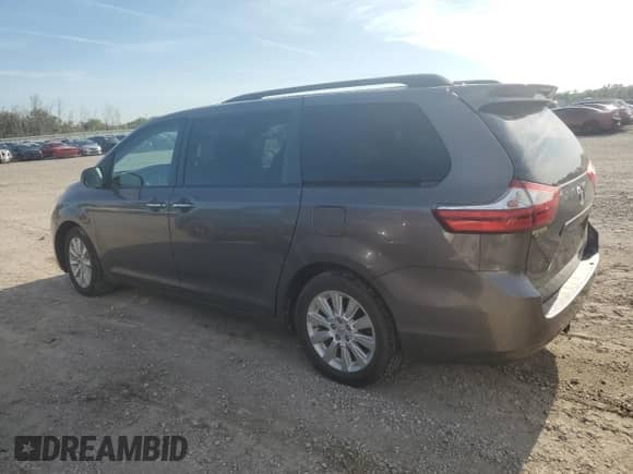 2015 Toyota Sienna Limited с VIN 5TDDK3DC2FS094437, выставлен на аукционе Copart как лот 70261915 с пробегом 211 627 миль миль и Списание • Salvage title. История ставок и продаж доступна на DreamBid. Изображение 2.