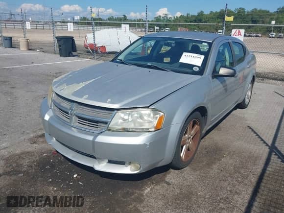 2008 Dodge Avenger SXT with VIN 1B3LC56R98N607599, listed as a IAAI auction lot 43311090 with 163,056 mi miles and . Bid and sale history available at DreamBid. Image 2.
