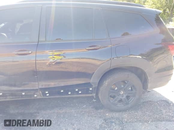 2022 Honda Pilot TrailSport with VIN 5FNYF6H84NB085965, listed as a IAAI auction lot 42556978 with 85,611 mi miles and . Bid and sale history available at DreamBid. Image 17.