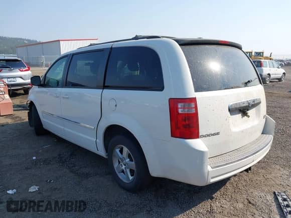 2009 Dodge Grand Caravan SXT with VIN 2D8HN541X9R627930, listed as a IAAI auction lot 43121675 with 184,278 mi miles and . Bid and sale history available at DreamBid. Image 3.