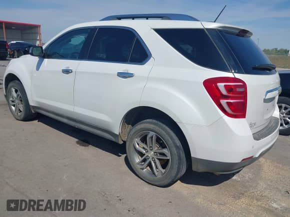 2016 Chevrolet Equinox LTZ z VIN 2GNALDEK9G6135113, wystawiony jako IAAI lot #43178441 z przebiegiem 99 289 mil mil oraz . Historia ofert i sprzedaży dostępna na DreamBid. Obrazek 3.