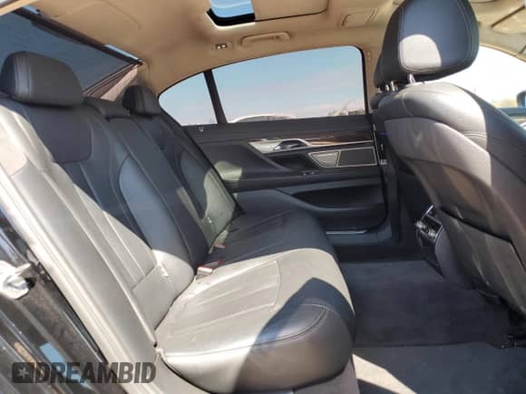 2017 BMW 7 Series 740i with VIN WBA7E2C57HG739983, listed as a Copart auction lot 81125295 with 218,285 mi miles and Clean title. Bid and sale history available at DreamBid. Image 10.