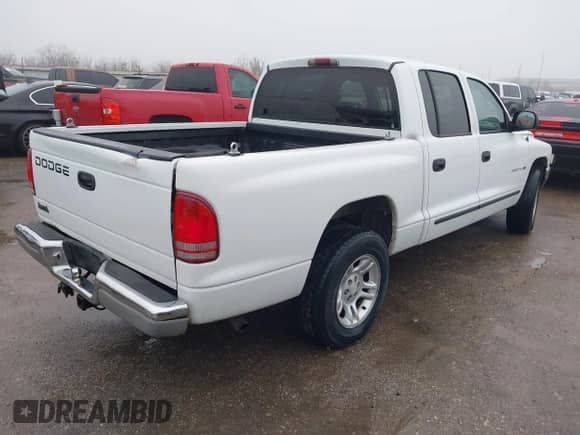 2002 Dodge Dakota SLT with VIN 1B7HL48N72S505915, listed as a IAAI auction lot 41451568 with 220,716 mi miles and . Bid and sale history available at DreamBid. Image 4.