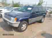 1994 Jeep Grand Cherokee Laredo with VIN 1J4GZ58Y7RC233746, listed as a IAAI auction lot 42722206 with 196,875 mi miles and . Bid and sale history available at DreamBid. Image 2.