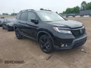 2021 Honda Passport Elite z VIN 5FNYF8H04MB028752, wystawiony jako IAAI lot #42682112 z przebiegiem 45 256 mil mil oraz . Historia ofert i sprzedaży dostępna na DreamBid. Obrazek 1.