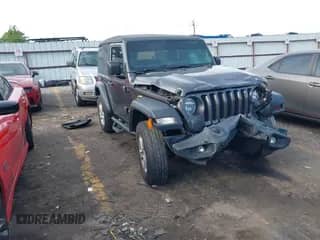 2020 Jeep Wrangler Sport S with VIN 1C4GJXAG9LW303604, listed as a IAAI auction lot 42221305 with 71,189 mi miles and . Bid and sale history available at DreamBid. Image 1.