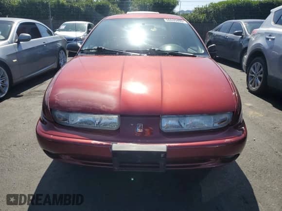 1999 Saturn SW with VIN 1G8ZK8276XZ298564, listed as a Copart auction lot 55535485 with 91,144 mi miles and Salvage title. Bid and sale history available at DreamBid. Image 5.