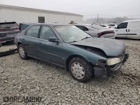 1997 Honda Accord LX with VIN 1HGCD5638VA234390, listed as a Copart auction lot 68820625 with 184,122 mi miles and Salvage title. Bid and sale history available at DreamBid. Image 4.