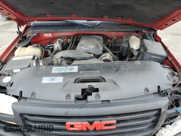 2003 GMC Sierra 1500 Work Truck with VIN 1GTEC14V23Z170224, listed as a Copart auction lot 66725914 with 244,536 mi miles and Salvage title. Bid and sale history available at DreamBid. Image 12.